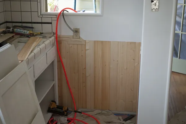 Installing beadboard wainscoting for this kitchen located in Long Beach CA